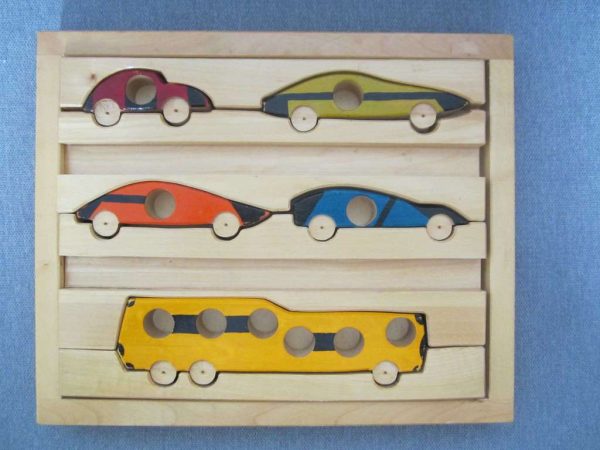 Puzzle en bois avec 5 véhicules colorés, dim. 28.5 x 23.5 cm