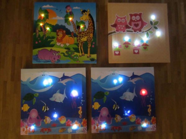 Lot de 4 toiles LED avec jeu de lumières (env. 40 x 40 cm)