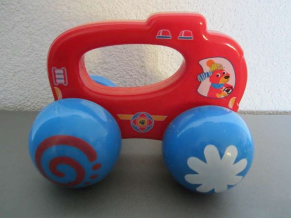 Jouet 1er âge : voiture à roulettes hochet (d'occasion)