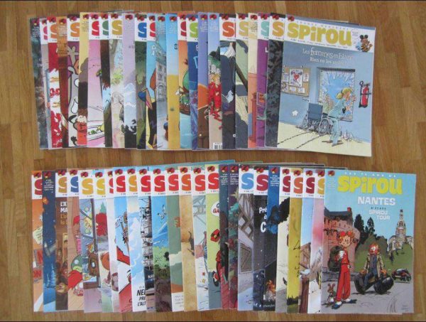 Lot de 49 magazines hebdomadaires "Spirou" 2013/2014.