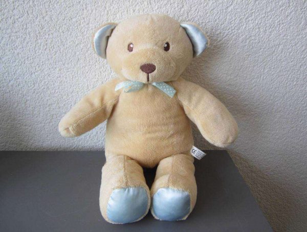 Doudou ours avec grelot à l'intérieur