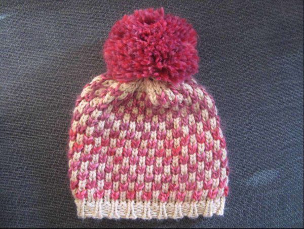 Bonnet avec pompon enfant ATRIUM rose/beige (neuf)
