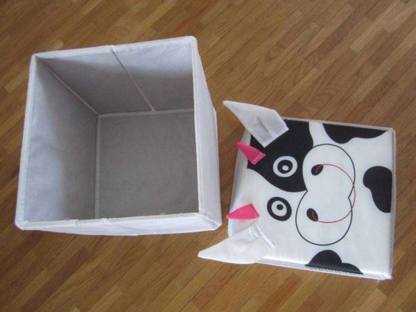 Pouf de rangement "vache" pliable : selon photos