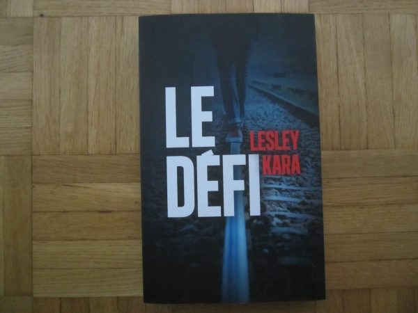 Livre grand format : Le défi, Lesley Kara (NEUF)